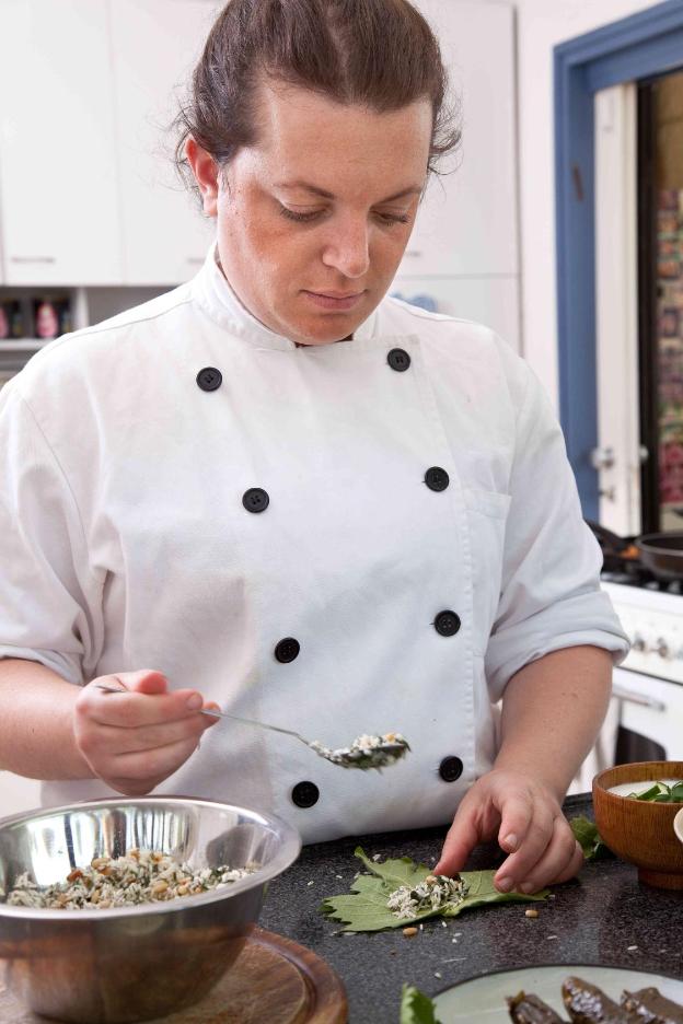 chef preparing a Greek cuisine