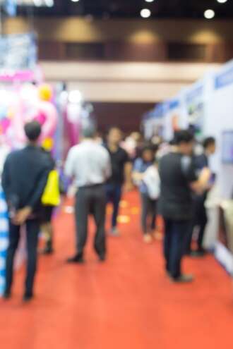 Professional exhibition and branded display booths at a business event in Greece, planning and production of trade shows and corporate conferences by Sirtaki Events.